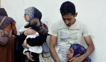 A woman mourns Palestinians killed in Israeli strikes in Rafah, in the southern Gaza Strip, May 8, 2024. (Reuters)