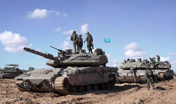 Israeli troops drive further into Rafah as tanks split city in two