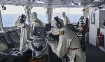 Members of the HMS Diamond's Bridge team shoot down a missile fired by Houthis from Yemen, Wednesday, April 24, 2024. (AP)