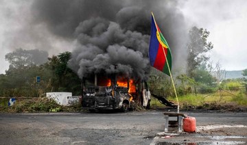 Protesters block New Caledonia roads as French police pour in