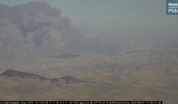 California firefighters battle wind-driven wildfire east of San Francisco