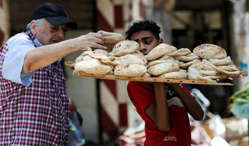 Egyptians struggle with first bread subsidy cut in decades