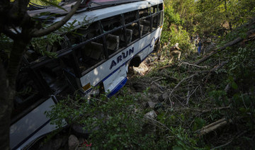 At least 9 dead after suspected militants in Kashmir fire at Hindu pilgrims, sending bus into gorge