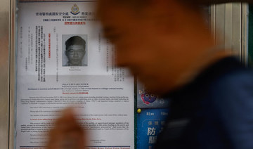 Hong Kong invokes new law to cancel passports of 6 overseas-based activists
