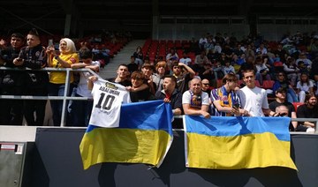 Ukraine arrive at Euro 2024 to a patriotic welcome and vivid reminder of the war at home