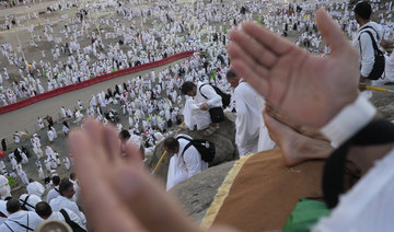 Muslim pilgrims converge at Mount Arafat for daylong worship as Hajj reaches its peak