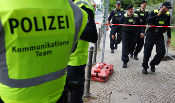 German police shoot to death an Afghan man who killed a compatriot, then attacked soccer fans