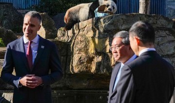 China Premier Li starts Australia trip with Adelaide panda announcement, winery visit