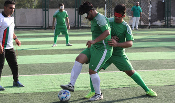 Members of Iraq's first national football team for the visually impaired, train at a sports club in Baghdad on May 22, 2024. 