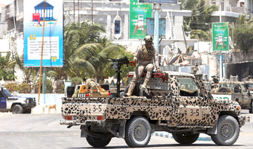 A Somali security officer stands guard near the scene of a terror attack in Mogadishu. (Reuters file photo)