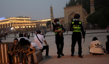 Police officers patrol the square in front of Id Kah Mosque in Kashgar, Xinjiang Uyghur Autonomous Region, China, May 3, 2021. 