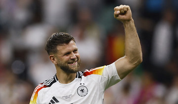 Last-gasp Fuellkrug goal rescues top spot for Euro hosts Germany