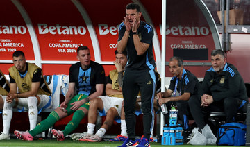 Argentina coach Lionel Scaloni reacts. REUTERS
