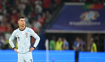 Cristiano Ronaldo just avoided being hit by a fan who jumped from the crowd to get to him at Euros