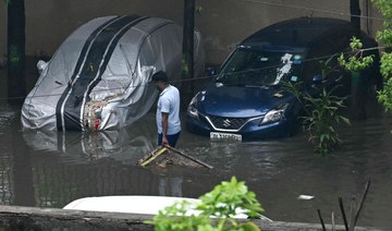 Eleven dead in Indian capital after heavy rain, flight operations stutter