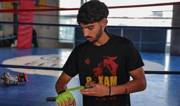 First Palestinian Olympic boxer fights hurdles before history