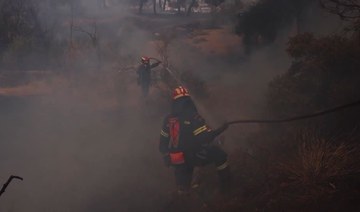 Firefighters battle wildfires on 2 Greek islands as premier warns of a dangerous summer