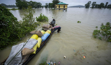 Floods and landslides triggered by heavy rains in India’s northeast kill at least 16 people