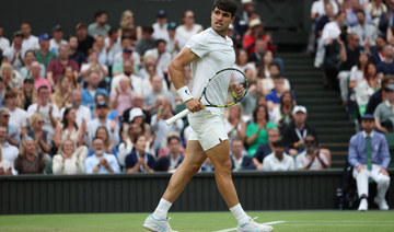 Defending Wimbledon champion Carlos Alcaraz comes back to beat Frances Tiafoe in the third round