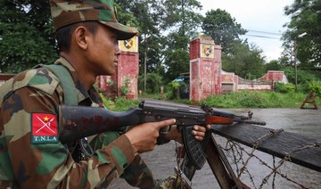 ‘This poor, miserable life’: new Myanmar clashes turn town to rubble