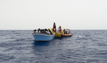 Armed bandits interrupt a rescue of migrants in the Mediterranean off Libya, an aid group says