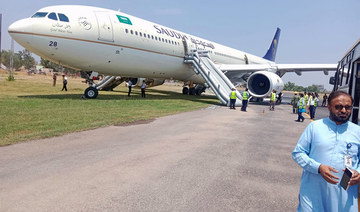 Saudi Airlines flight’s landing gear catches fire at Peshawar airport, prompting emergency response