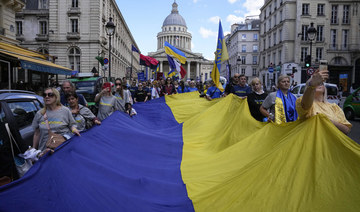 Peaceful pre-Olympic protest in Paris honors fallen Ukrainian athletes