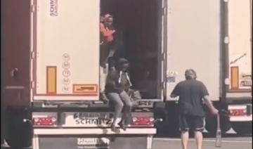 Video of driver lashing migrants in back of lorry sparks indignation in Italy