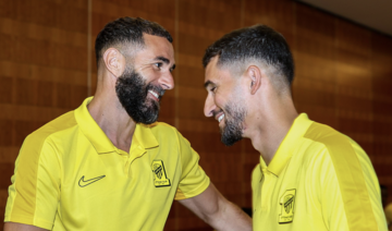 Karim Benzema welcomes Houssem Aouar to Al-Ittihad’s training camp in Alicante, Spain. (X/@ittihad_en)