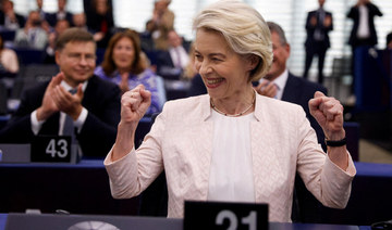 Ursula von der Leyen reacts after being chosen President of the European Commission for a second term, at European Parliament.