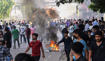 Bangladesh protesters set state TV HQ ablaze as toll mounts, Internet cut