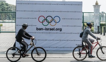 Palestinian Olympic team greeted with cheers and gifts in Paris