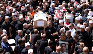 Thousands of Druze mourn youths killed in Golan rocket attack