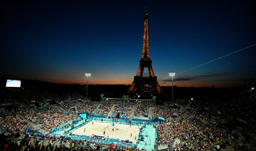 Beach volleyball at Eiffel Tower Stadium draws the crowds looking for the perfect social media post