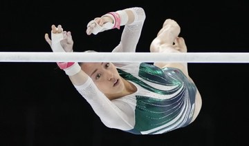 Nemour impresses with her bars routine at Olympics after switching to the Algerian team 