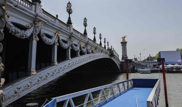 Olympic triathletes will swim in Paris’ Seine River after days of concerns about water quality