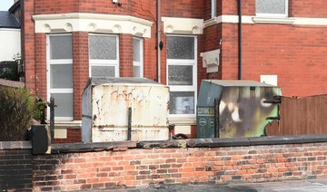 Damage is seen outside the Southport Islamic Society Mosque in Southport, northwest England, on July 31.