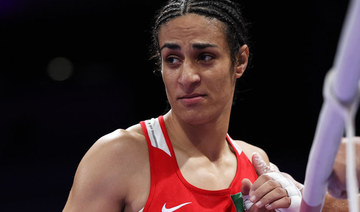 Algeria boxer who had gender test issue wins first Olympic fight in Paris when opponent quits