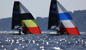 A lack of wind forces scuttles first Olympic sailing medal races, leaving sailors broiling