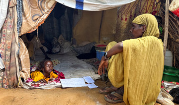 A displaced Sudanese woman rests inside a shelter at Zamzam camp, in North Darfur, Sudan, August 1, 2024. (REUTERS)