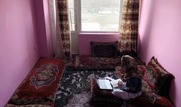 Barred from school, Afghan girls find temporary relief in online classes