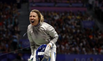 Ukraine wins its first gold medal of the Paris Olympics in women’s team saber fencing