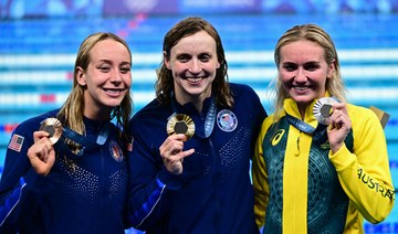 Ledecky makes Olympic history as McIntosh stars again in pool