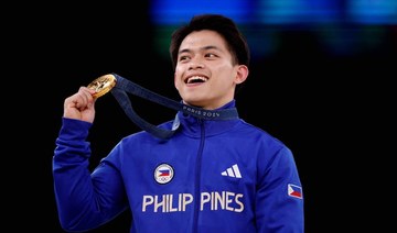 Philippines showers gymnast Carlos Yulo with praises, gifts after double Olympic gold