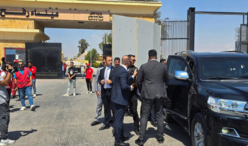 Turkish Foreign Minister Hakan Fidan arrives to the Rafah border crossing between Egypt and the Gaza Strip, in Rafah, Egypt.