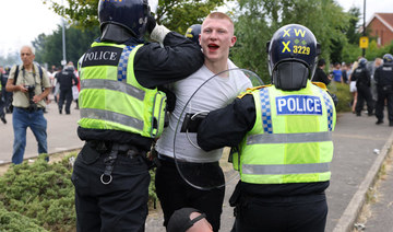 Man jailed for three years for punching police officer in UK anti-Muslim riots