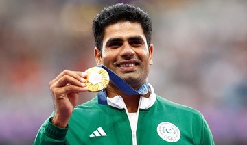 Pakistani javelin hero Arshad Nadeem receives gold medal at Paris Olympics ceremony