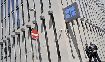 OPEC cuts oil demand growth forecast, highlighting dilemma over Oct. hike