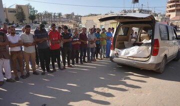 Palestinians attend the funeral of members of the Najjar family, killed in an Israeli strike, in Khan Yunis in southern Gaza.