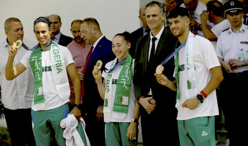 Imane Khelif and Kaylia Nemour return from Olympics to a warm welcome in Algeria